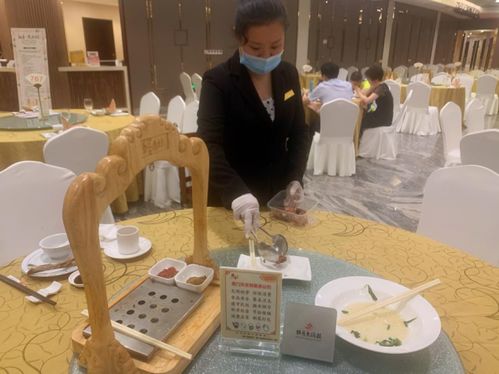 合理消費剩菜打包 廈門萬家餐飲服務單位勁吹文明風
